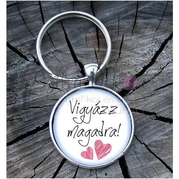 "Vigyázz magadra" üveglencsés kulcstartó