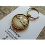 "Elmúlik" üveglencsés kulcstartó