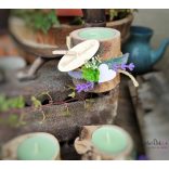 Díszített farönk mécsestartó felirattal