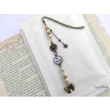 "Masni" KönyvÉkszer üveglencsés monogramos medállal