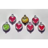 "Masni" KönyvÉkszer üveglencsés monogramos medállal